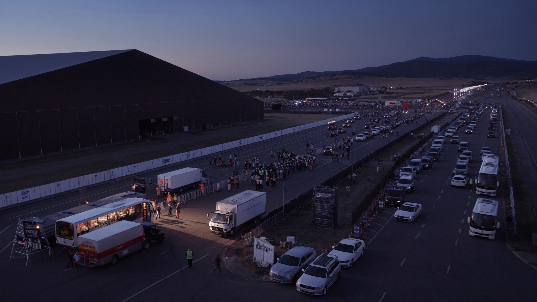 Australian event precinct with temporary traffic controls and coordinated vehicle movement