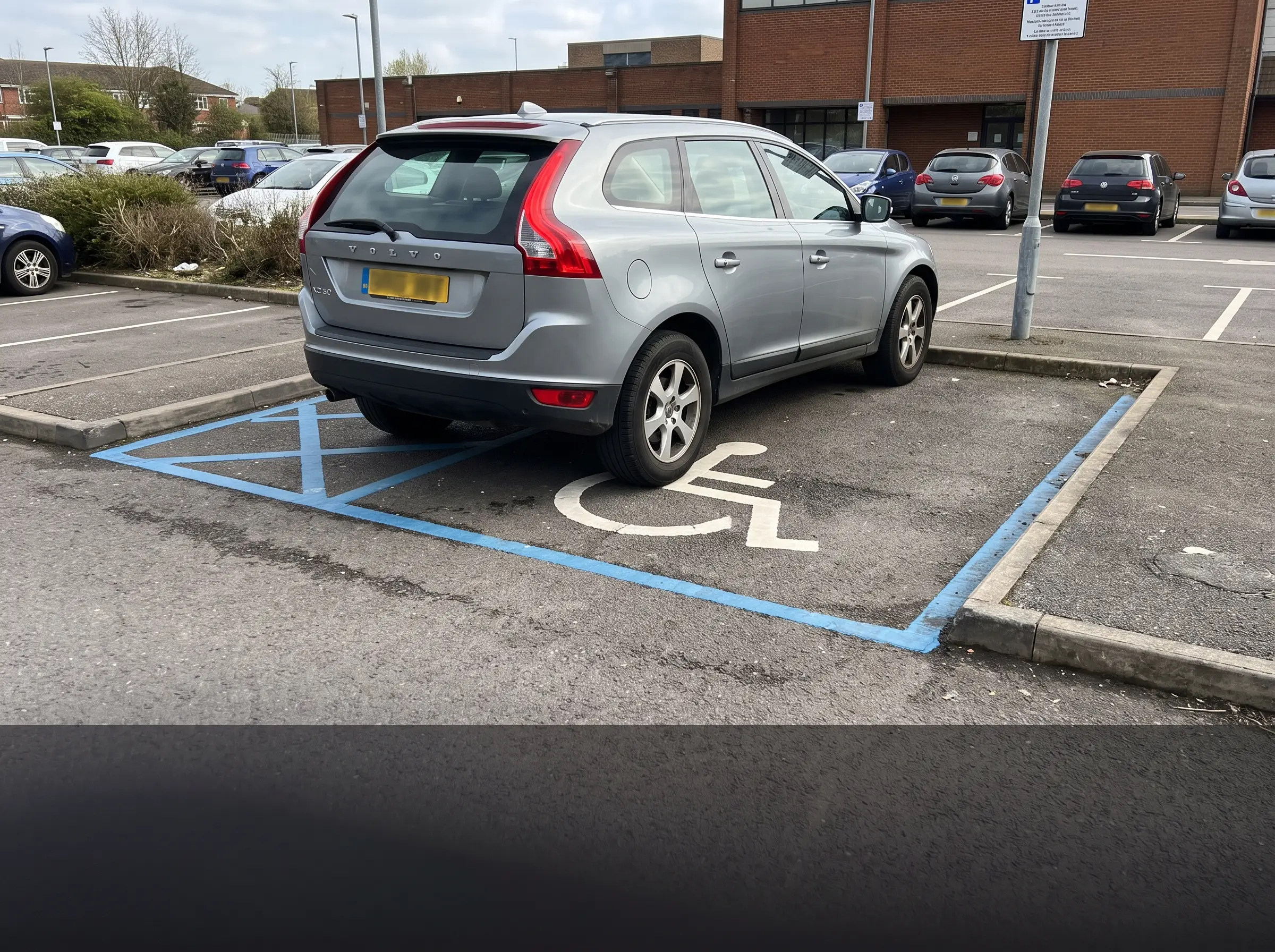 Vehicle observed in accessible parking bay evidence image